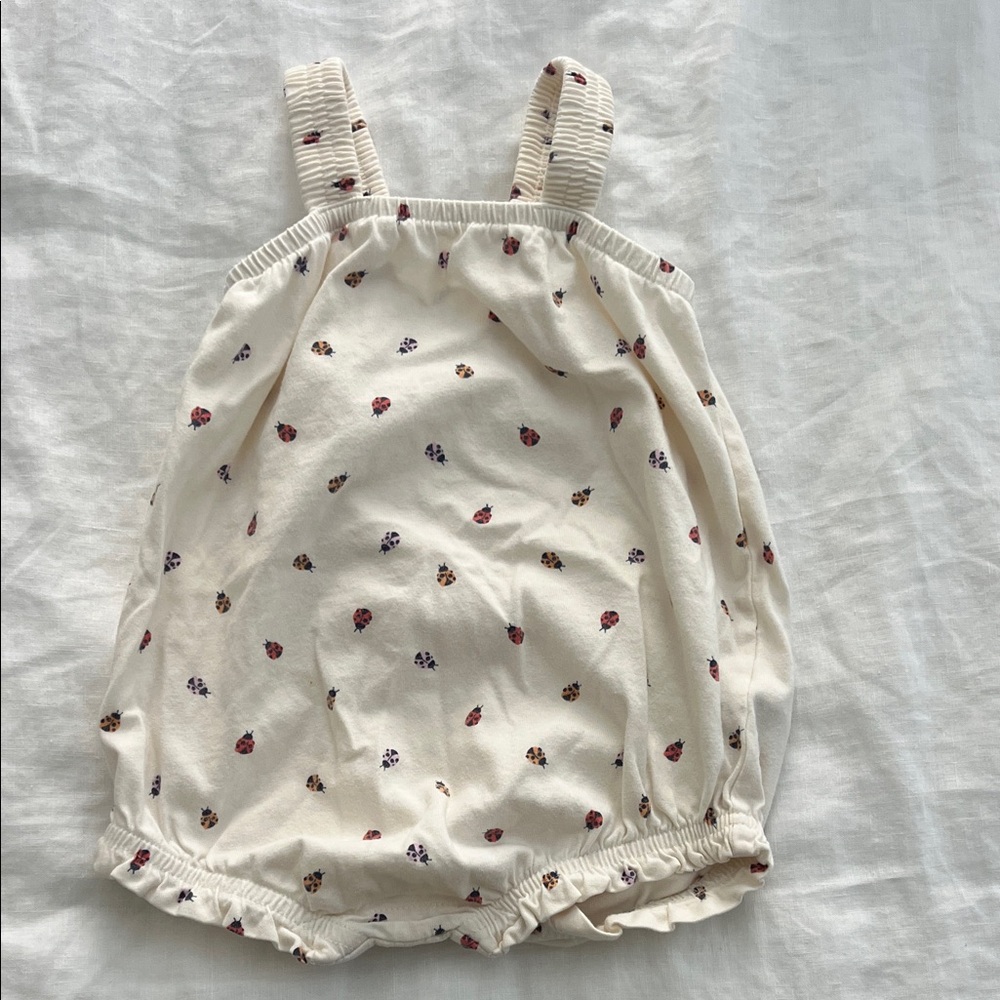 Cream Baby Romper with Ladybug Print